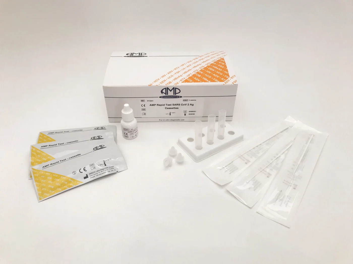 AMP Rapid Test SARS-CoV-2 Ag kit: box, cassettes, swabs and extraction tubes